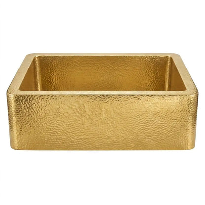 30-inch solid unlaquered brass farmhouse kitchen sink featuring deep single bowl hand-hammered texture and curved apron front on isolated white background