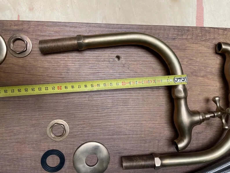 Two Basin faucet in unlacquered brass