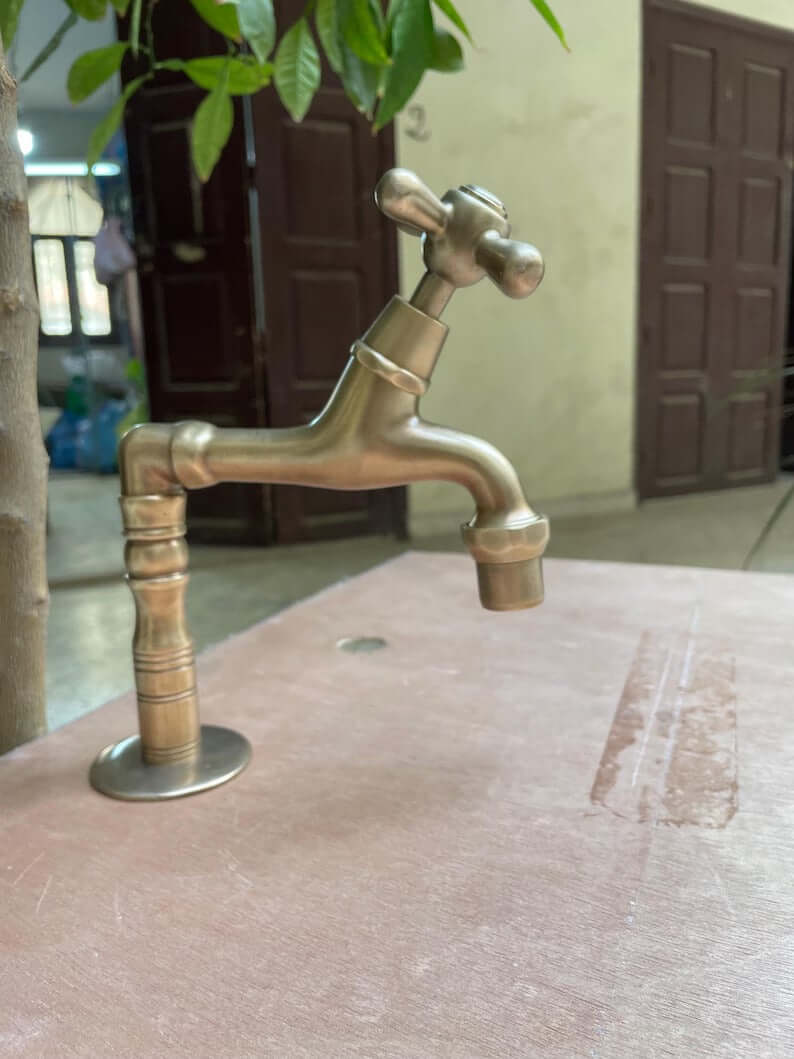 Elegant brass water filter faucet with single handle, showcasing a handcrafted finish designed for quality installation.