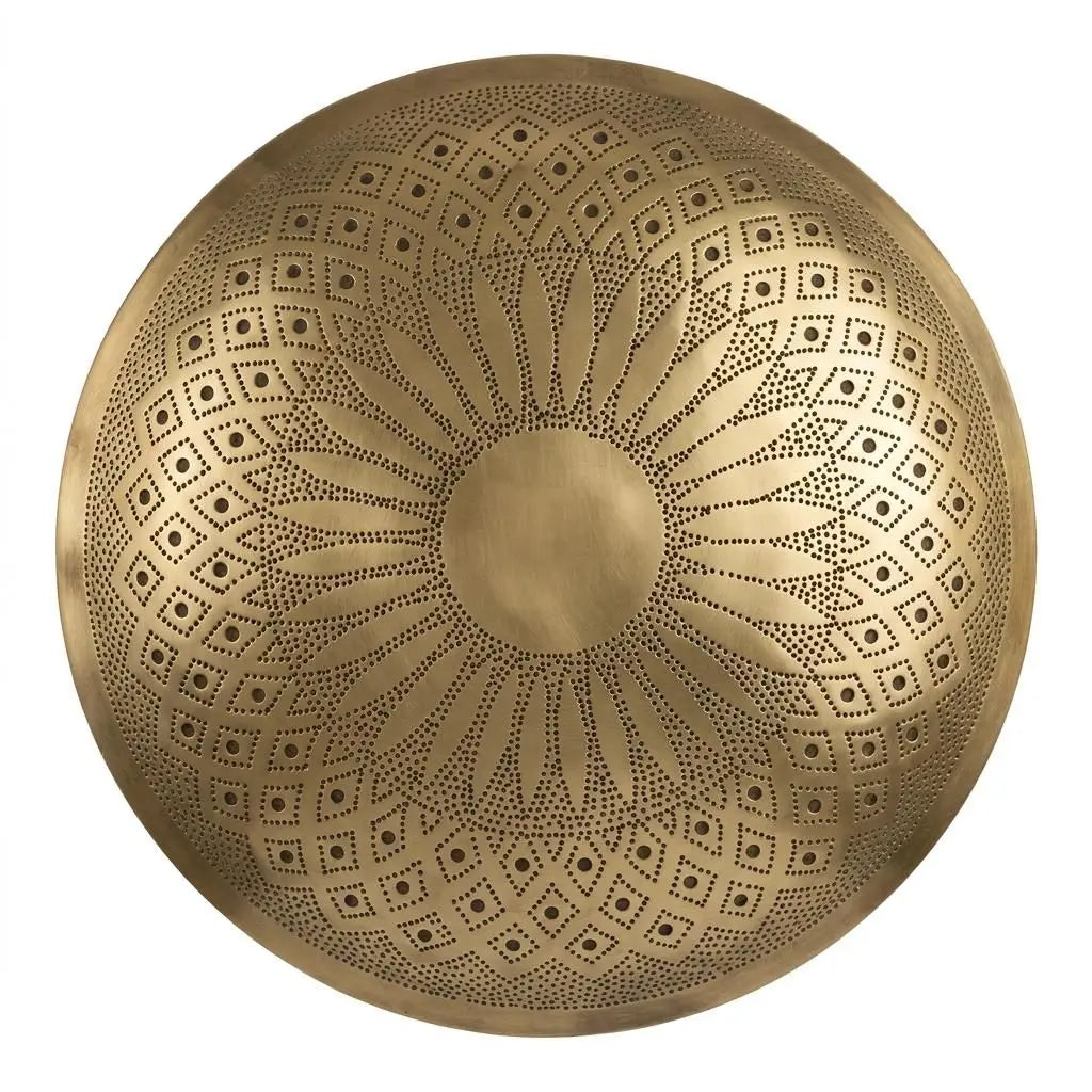 Detailed close-up of a round handmade Moroccan brass wall sconce with intricate hand-engraved patterns, isolated on a pure white background.