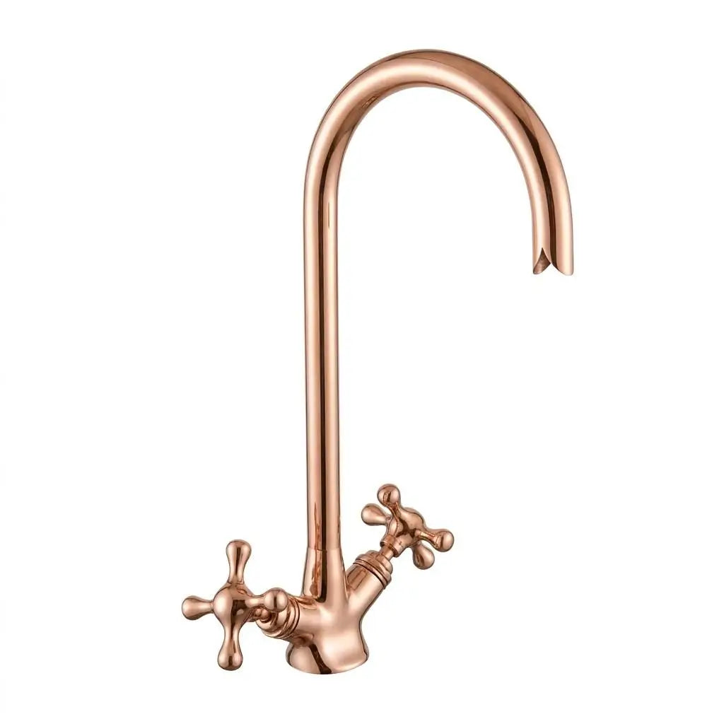 Isolated studio shot of a copper gooseneck faucet with dual cross handles on a plain white background.