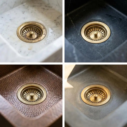 Four-panel showcase of a solid brass drain basket installed in different basin materials including white marble, black stone, and hammered copper kitchen sinks.