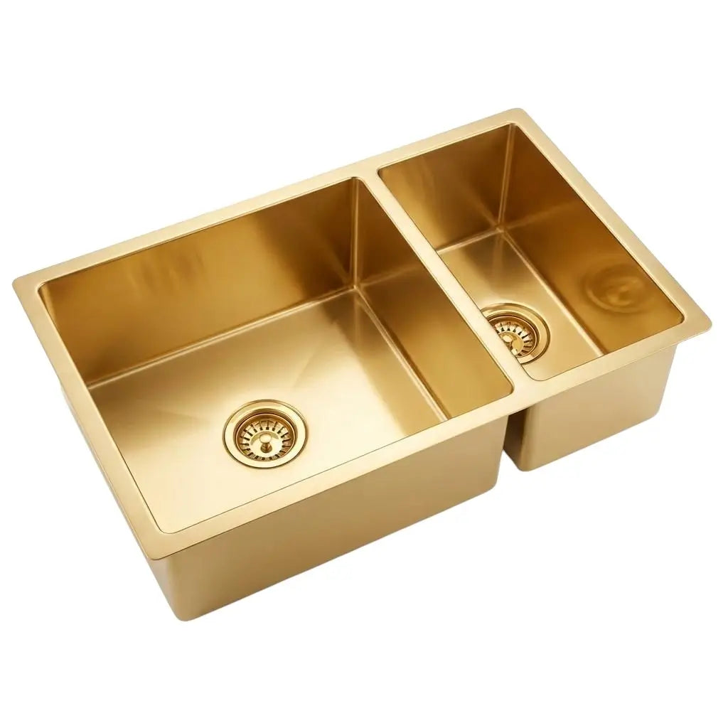 Product shot of a handcrafted undermount copper double basin kitchen sink with a premium brushed finish on a clean white background.