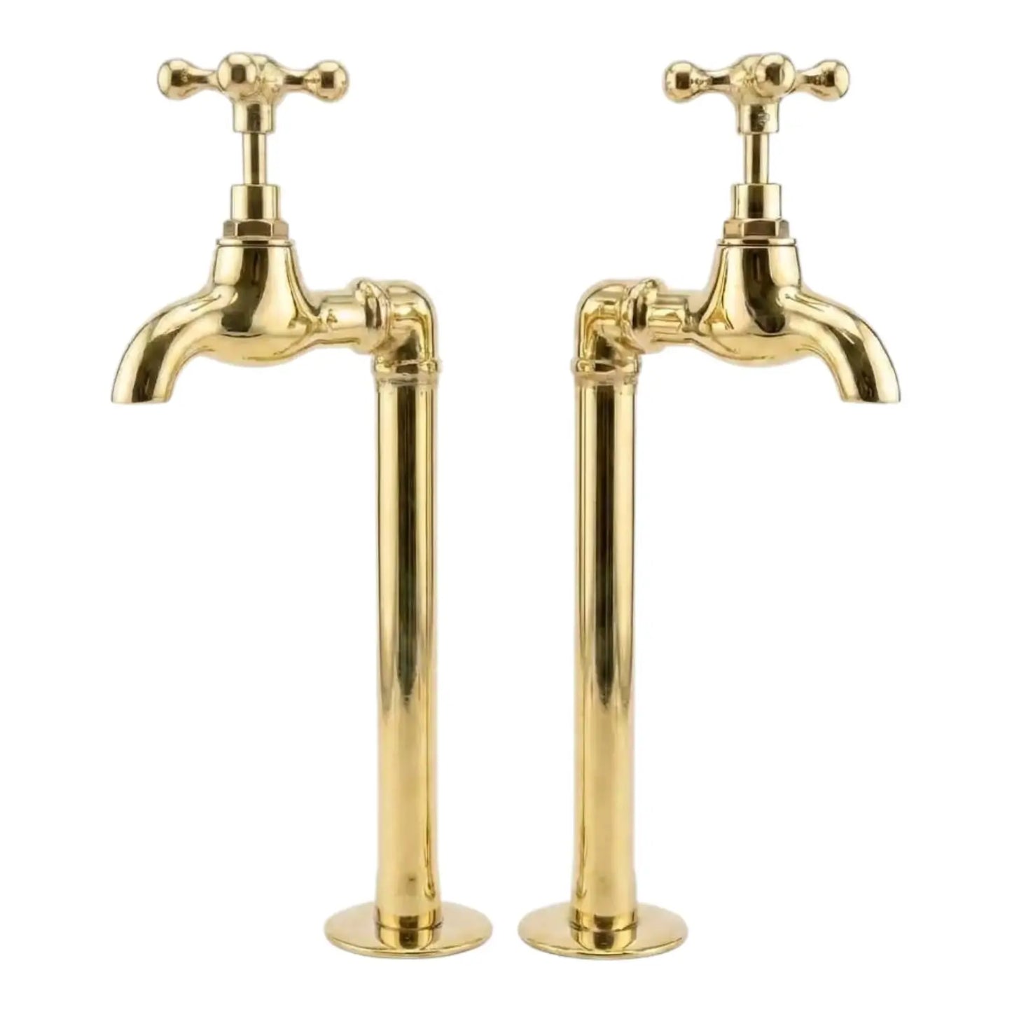 A pair of unlacquered brass wall mount water faucets with cross handles, isolated on a clean white background for a professional product view.