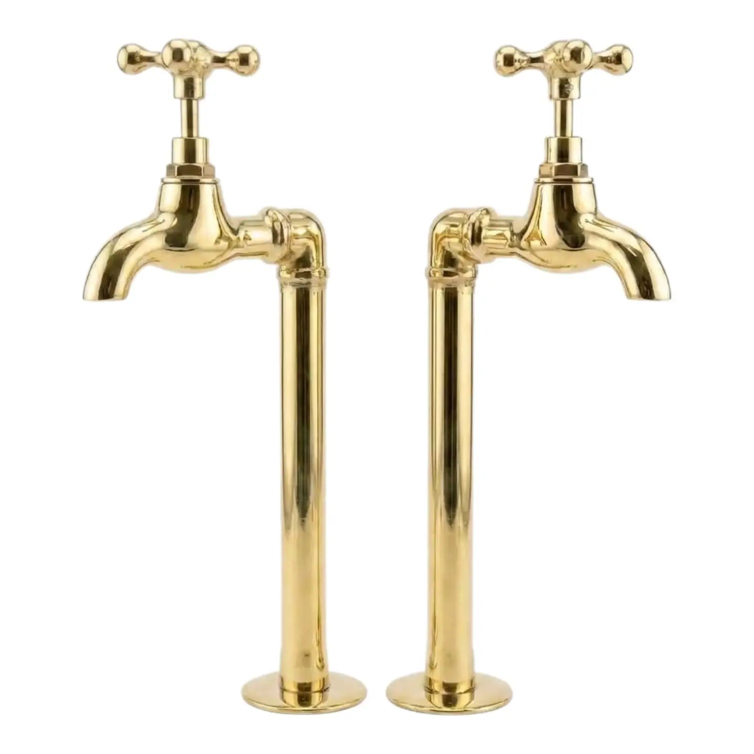 A pair of unlacquered brass wall mount water faucets with cross handles, isolated on a clean white background for a professional product view.